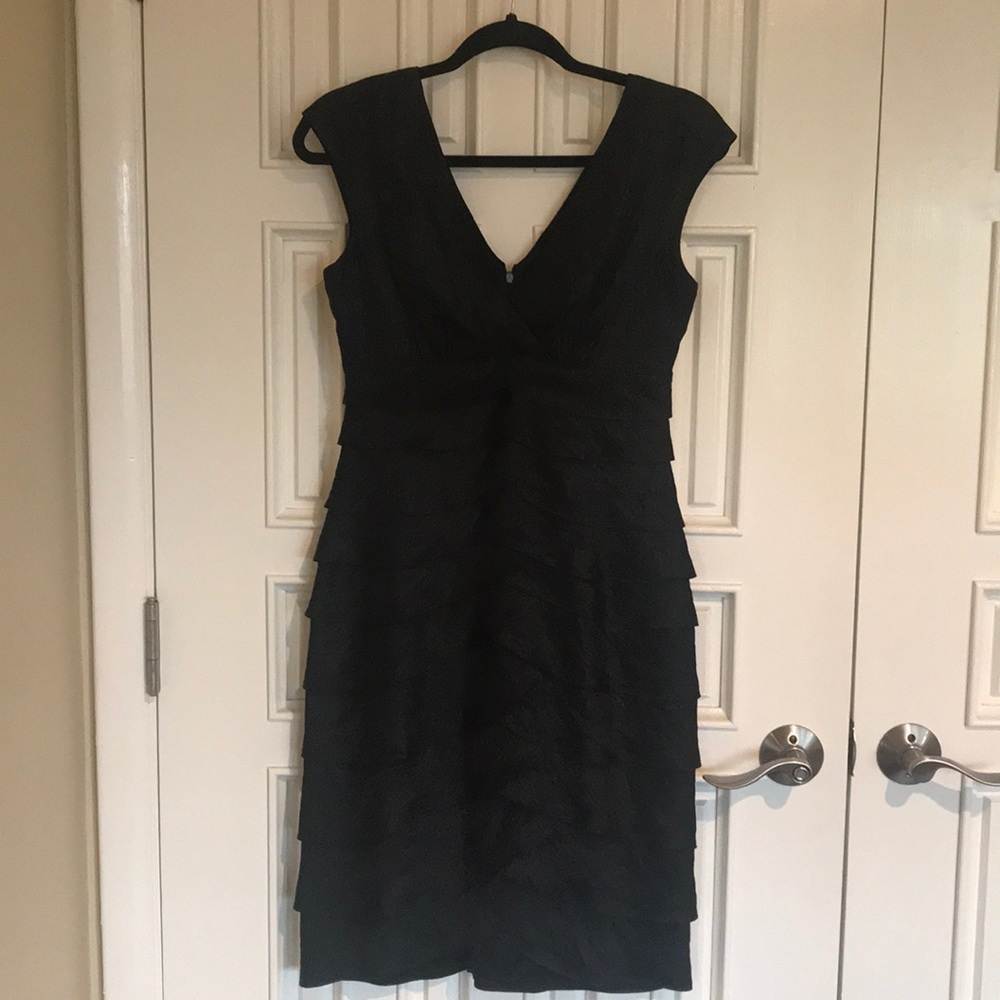 Black sleeveless cocktailDress.
